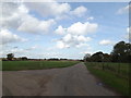 TM0763 : Footpath & entrance to Grange Farm by Geographer