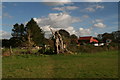 Dead tree and a footpath from the railway into Morton