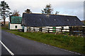 NG9693 : Barns at Mungasdale Cottage on the A832 by Ian S