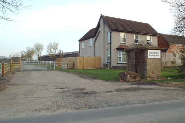 House by the entrance to Poplars Farm Business Park, Forshaw Heath Road