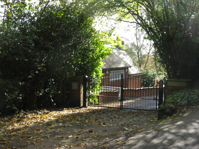 Holmbury:  Gated entrance to 'Moxley'