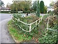 Overgrown footbridge and stream, Apsley End