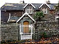 Ornate gate to The Waters Edge cottage