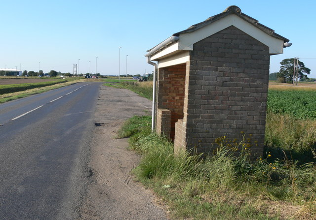 Brick bus shelter along the B1357 Common Road