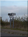 TM1680 : Roadsigns on Norgate Lane by Geographer