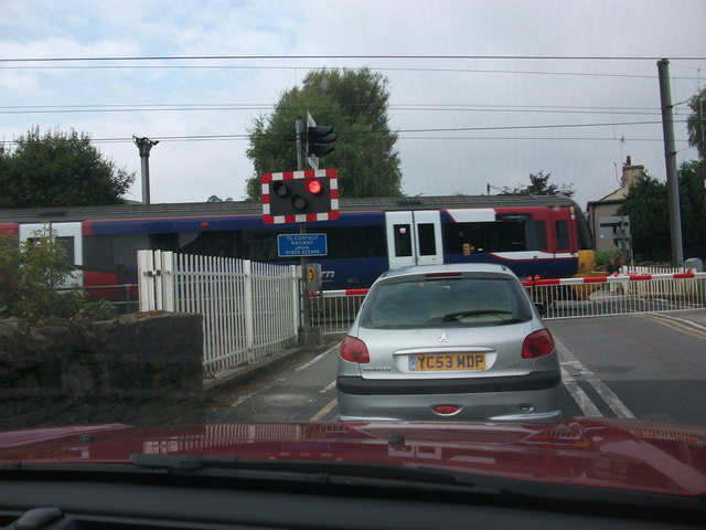 Cononley Level Crossing with train