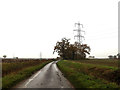 TM1379 : Dark Lane & Electricity Pylons by Geographer