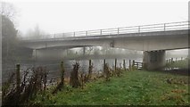 NY2524 : A66 bridge over the River Derwent by Graham Robson
