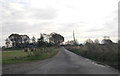 Minor road running through farm land