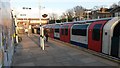 Northbound Central Line train at Leyton Station