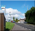 The twice-daily No32 Newcastle to Banbridge Translink service exiting Moneyslane on the A50