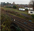 Across the tracks towards a church tower in Malvern