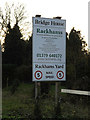 TM1179 : Bridge House sign at Rackhams Yard by Geographer