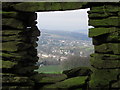 View through hole in wall from Long Lane towards Horwich End