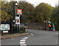 Signs near an entrance to Chirk railway station