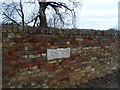 Date marker on wall to Woodhall Park