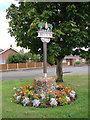 TG4803 : Belton village sign by Adrian S Pye