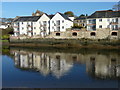 Apartment block reflected in the River Camel, Wadebridge