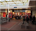 Metal benches and Blue Inc in Cwmbran Shopping Centre