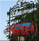 TM3569 : Peasenhall village sign (detail) by Adrian S Pye