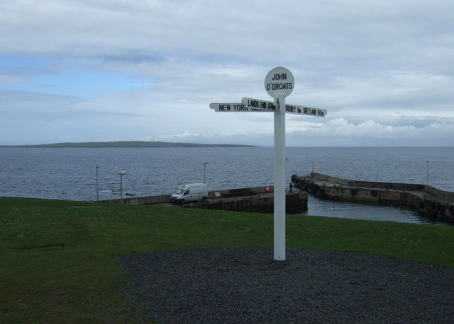 Fingerpost and harbour, John o' Groats