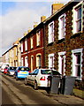 Wheelie bins, cars and houses in Griffithstown, Pontypool