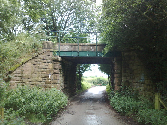 Bridge carrying former railway over farm track