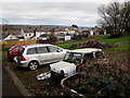 Two cars and two ex-cars in Griffithstown, Pontypool