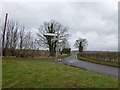 Direction post near Osgodby