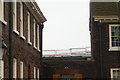 View of the Hoxton station platform from the grounds of the Geffrye Museum