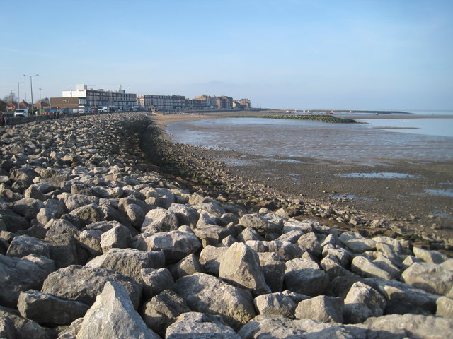 Winter sun on the boulders of Morecambe sea front