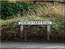 TM4557 : Church Farm Road sign by Geographer