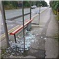 Smashed bus shelter on Wimborne Road