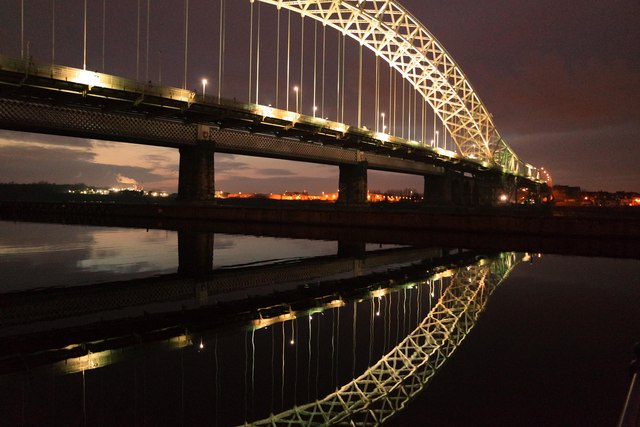 Runcorn Bridge at night from the banks of the Mersey