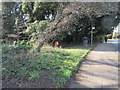 Bus stop with litter bin