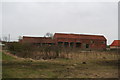 Traditional farm buildings and implement sheds at West Torrington Grange