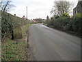 Station Road and stone marker, Clive