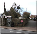 Signpost and BT grey phonebox in Littledean