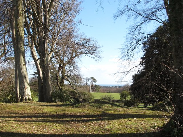 View across woodland to the Jocelyn Obelisk at Tollymore Park