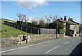 SE0326 : Trough and houses, Jim Allen Lane, Midgley by Humphrey Bolton