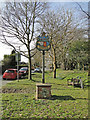 Thorndon village sign outside the church