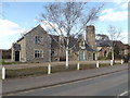 TM2381 : Needham Coronation Village Hall & St.Peter's Church by Geographer