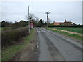 Minor road heading south east by Newholme Farm