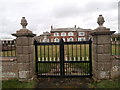 Gate to Carleton Hill Farm, on the A6 near Carlisle