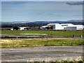 SJ8981 : View across Woodford Aerodrome from Old Hall Lane by David Dixon