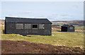 NY8151 : Shooting huts near Thirlwell Cleugh by Trevor Littlewood