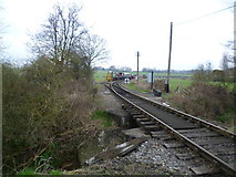 TQ8632 : Looking up the line from the level crossing at Rolvenden by Marathon