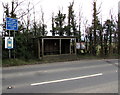 Wooden bus shelter and village noticeboard, New Town, Toddington