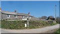 Junction with old finger post at Tregiskey