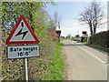 TM1482 : Road sign design number 779,  overhead cables by Adrian S Pye